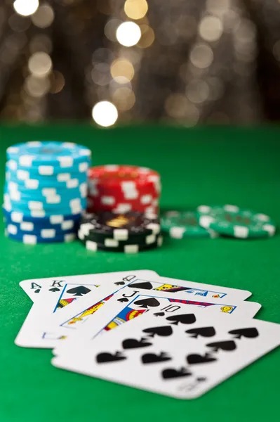 Live roulette table with dealer and players